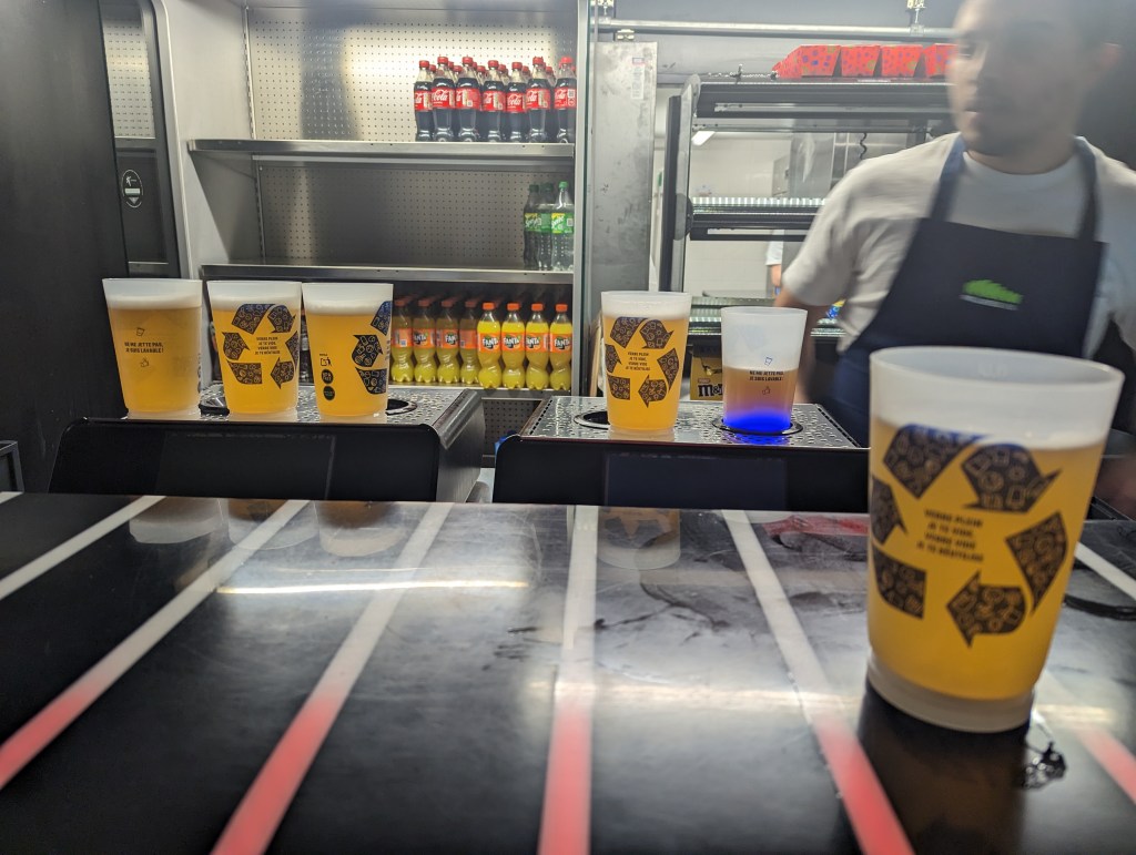 Parisians lining up beers after the show.